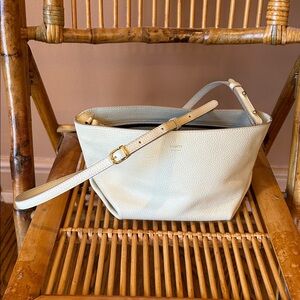 Khaite cream pebbled leather envelope pleat crossbody clutch bag